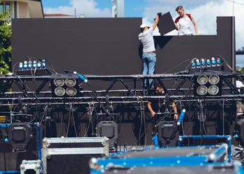 Pro AVL video solutions video wall installation Experienced AV professional actively participating in video wall installation work