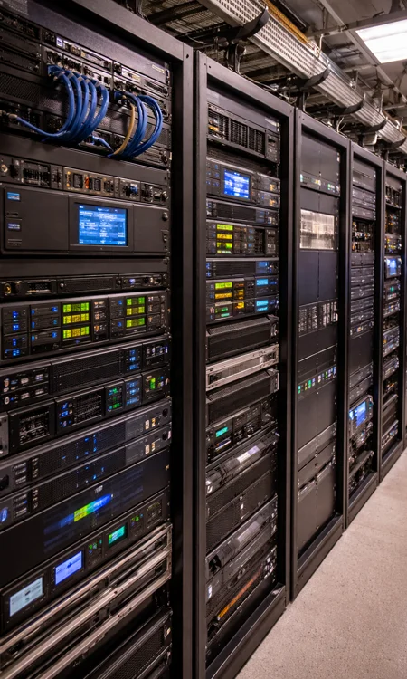 AV Infrastructure Systems AV equipment racks with organized cabling in church installation