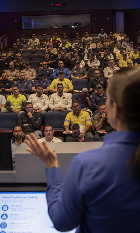 FP&L Safety Training Session from the Instructor's Perspective View from the stage during an FP&L field technician safety training session showing attendees in a modern auditorium